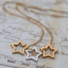 Triple star necklace