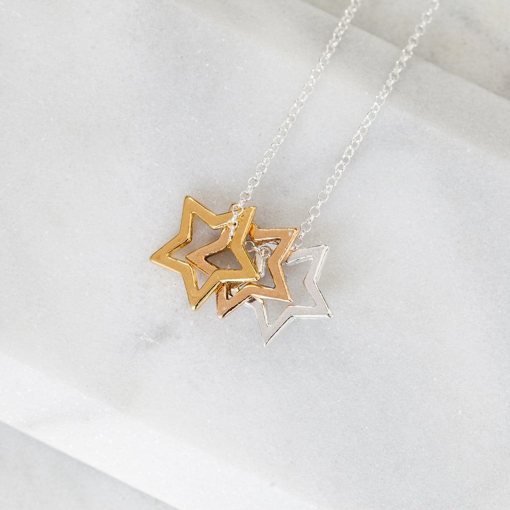 Triple star necklace